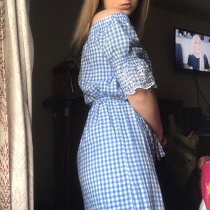 off the shoulder blue and white dress.